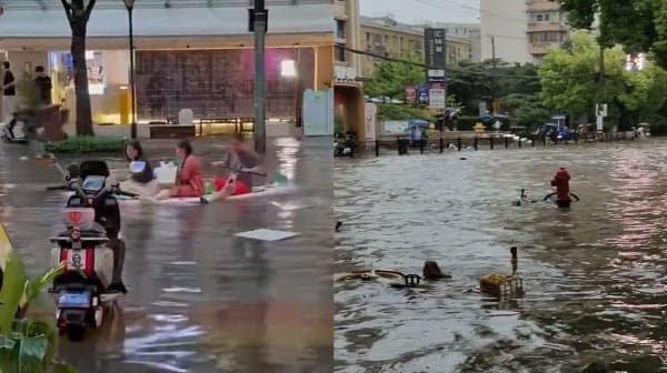上海暴雨成灾街道行船 有一楼进水大超市被淹(图)
