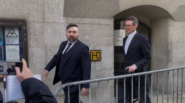英判两中共间谍长期监禁 民主活动人士:远远不够(图)
