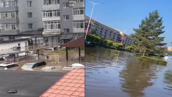 吉林多地暴雨成灾 敦化洪水漫城车辆只剩车顶(图)